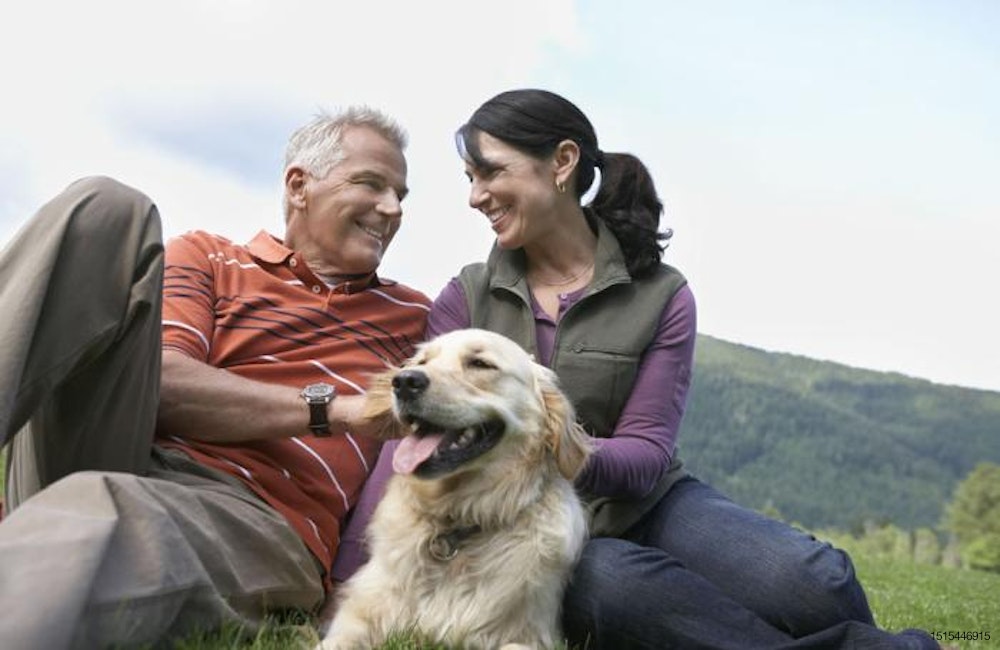 middle-aged-couple-with-dog