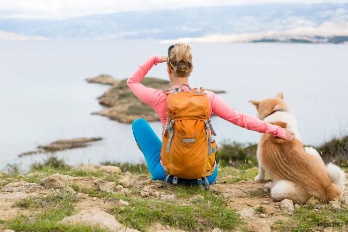 woman-backpacking-with-dog