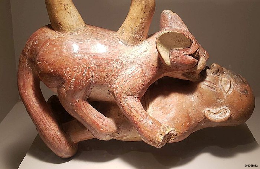 cat-eat-man-Moche-Peru-art-ceramics.jpg