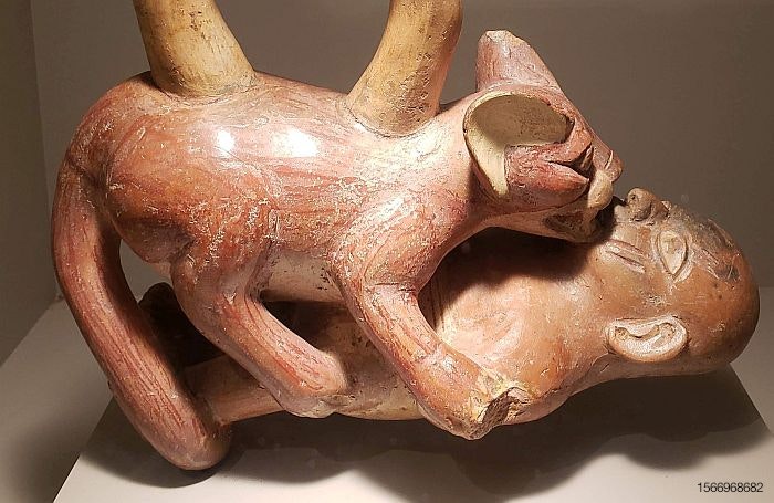 cat-eat-man-Moche-Peru-art-ceramics.jpg