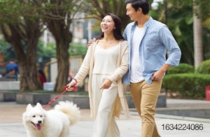 Chinese-woman-man-with-dog-in-park